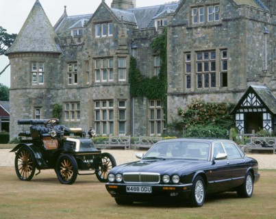 1995 Daimler Double six with 1899 Daimler outside Palace House. Artist: Unknown.
