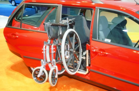 Wheelchair access into car. Artist: Unknown.