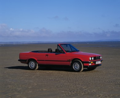 1987 BMW 325i convertible. Artist: Unknown.