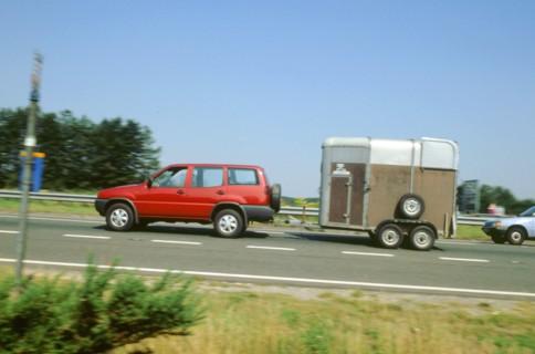 1997Ford Maverick towing horse box. Artist: Unknown.
