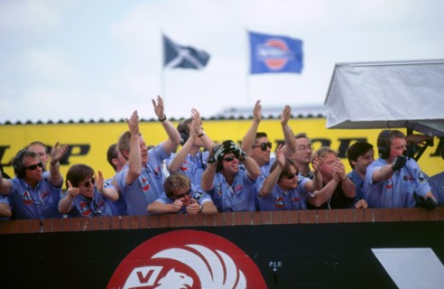 Nissan team celebrate victory 1998 British touring cars.. Artist: Unknown.