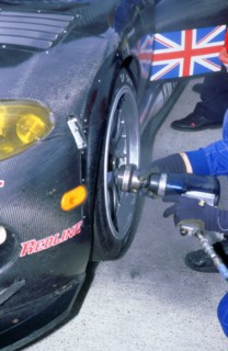 1999 Chrysler Viper,fia gt silverstone 500,wheel gun in pits. Artist: Unknown.