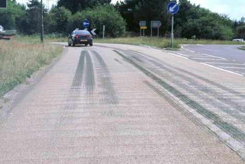 Tyre skidmarks on road surface. Artist: Unknown.