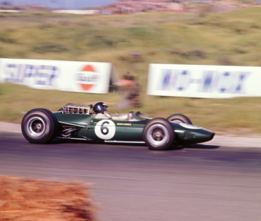 James Clark driving a 1966 Lotus 33 Climax V8. Artist: Unknown.