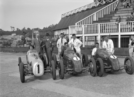 Austin 7 works team, Brooklands 1937. Artist: Bill Brunell.