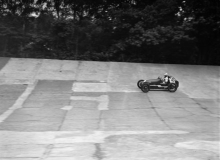 Charles Goodacre's Austin OHC 744 cc, LCC Relay GP, Brooklands, 26 July 1937. Artist: Bill Brunell.