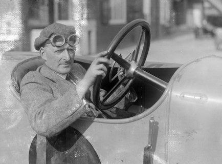 RJ Sully behind the wheel of a HE 14/40, Brooklands. Artist: Bill Brunell.