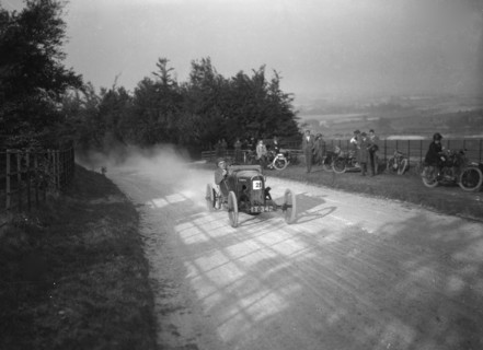 HR Godfrey driving a GN Bluebottle, Inter-Varsity Hillclimb, Tring, Hertfordshire, 5 March 1921. Artist: Bill Brunell.
