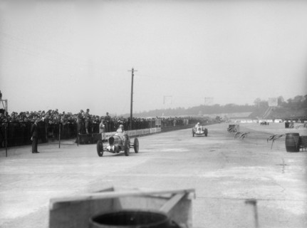 MG cars of Doreen Evans and John Henry Tomson Smith, JCC International Trophy, Brooklands, 1936. Artist: Bill Brunell.
