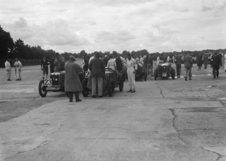 MG and Austin 7 at the LCC Relay GP, Brooklands, 25 July 1931. Artist: Bill Brunell.