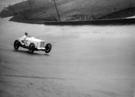 Sunbeam racing at a BARC meeting, Brooklands, 16 May 1932. Artist: Bill Brunell.