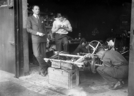 Working on the chassis of Raymond Mays' 2996 cc Vauxhall-Villiers. Artist: Bill Brunell.