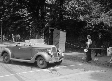 DJH Currie's Ford V8, winner of a silver award at the MCC Torquay Rally, July 1937. Artist: Bill Brunell.