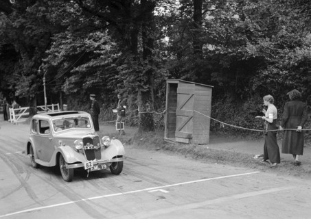 Riley of JM Laing, winner of a bronze award at the MCC Torquay Rally, July 1937. Artist: Bill Brunell.