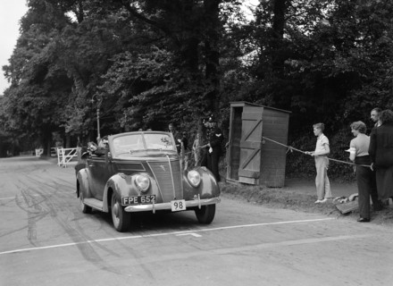 ADC Gordon's Ford V8, winner of a silver award at the MCC Torquay Rally, July 1937. Artist: Bill Brunell.
