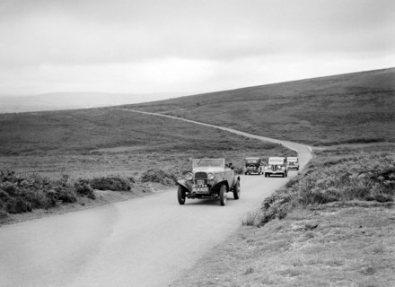 Ford V8s of WCN Norton and J Harrison competing at the MCC Torquay Rally, July 1937. Artist: Bill Brunell.