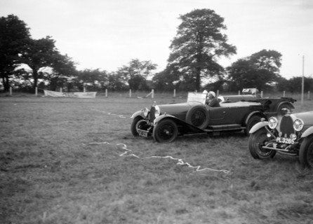 Two Bugatti Type 44s taking part in the Bugatti Owners Club gymkhana, 5 July 1931. Artist: Bill Brunell.