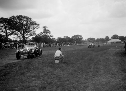Aston Martin and Bugatti Type 43s taking part in the Bugatti Owners Club gymkhana, 5 July 1931. Artist: Bill Brunell.