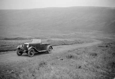Kitty Brunell road testing a MG 18/80, April 1931. Artist: Bill Brunell.