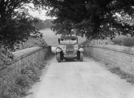Kitty Brunell road testing a 1931 Delage D8. Artist: Bill Brunell.