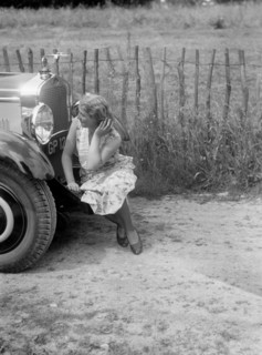 Kitty Brunell road testing a 1931 Delage D8. Artist: Bill Brunell.