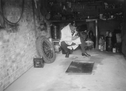 FA Thatcher in his garage. Artist: Bill Brunell.