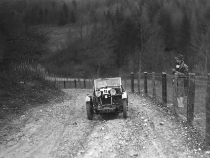 Viscount Curzon's MG M type 12/12 replica competing in the Inter-Varsity Trial, November 1931. Artist: Bill Brunell.