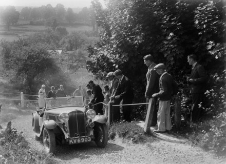 Triumph 2-seater taking part in a West Hants Light Car Club Trial, Ibberton Hill, Dorset, 1930s. Artist: Bill Brunell.