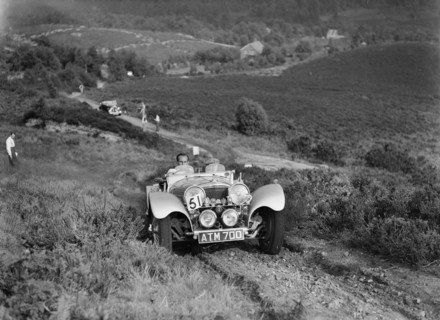 1936 Jaguar SS100 taking part in the NWLMC Lawrence Cup Trial, 1937. Artist: Bill Brunell.