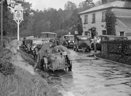 Riley Brooklands outside the Stonor Arms Hotel, Henley-on-Thames, Inter-Varsity Trial, 1930. Artist: Bill Brunell.