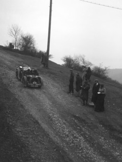 Singer of CV Glass climbing Nailsworth Ladder, Sunbac Colmore Trial, Gloucestershire, 1934. Artist: Bill Brunell.