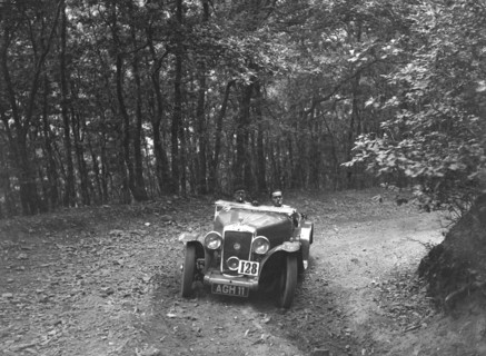 Hillman Aero Minx competing in the B&HMC Brighton-Beer Trial, Fingle Bridge Hill, Devon, 1934. Artist: Bill Brunell.