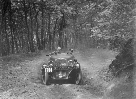 1496 cc Singer competing in the B&HMC Brighton-Beer Trial, Fingle Bridge Hill, Devon, 1934. Artist: Bill Brunell.