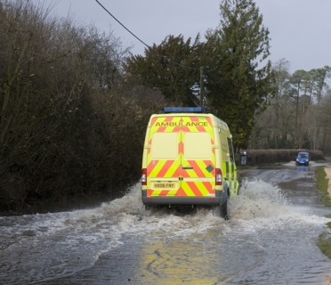 Ambulance driving through Floods at Beauleu 2008. Artist: Unknown.