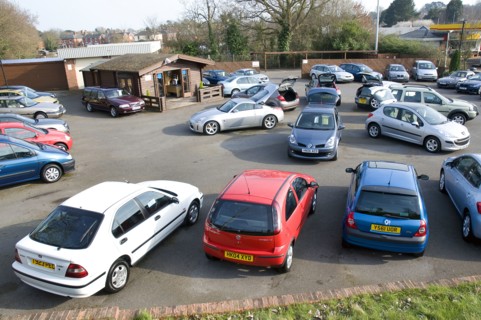 Used Car Dealership Forecourt 2009 Artist: Unknown.