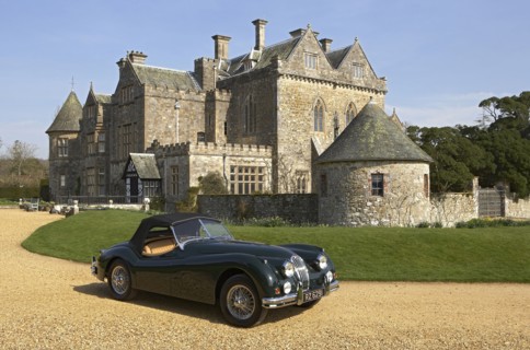 1954 Jaguar XK140 outside Palace House, Beaulieu Artist: Unknown.