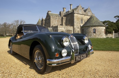 1954 Jaguar XK140 outside Palace House, Beaulieu Artist: Unknown.