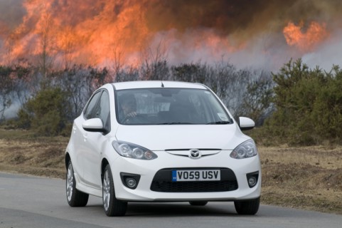 2010 Mazda 2 Sport, controlled burning in New Forest Artist: Unknown.