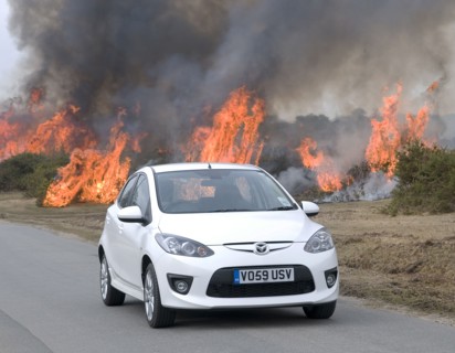 2010 Mazda 2 Sport, controlled burning in New Forest Artist: Unknown.