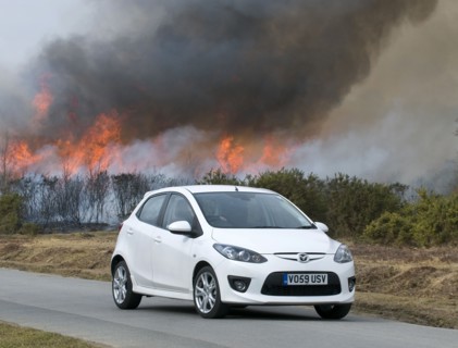 2010 Mazda 2 Sport, controlled burning in New Forest Artist: Unknown.