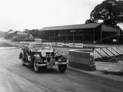 1937 Riley Lynx at Goodwood Artist: Unknown.