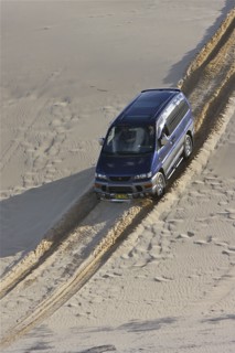 Mitsubishi Delica Space Gear V6 1996 in sand dunes New South Wales Australia Artist: Unknown.