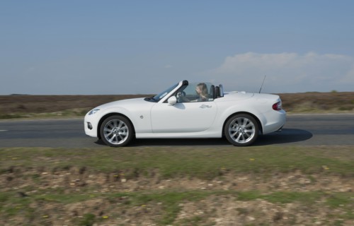 2014 Mazda MX5 Roadster Coupe Artist: Unknown.
