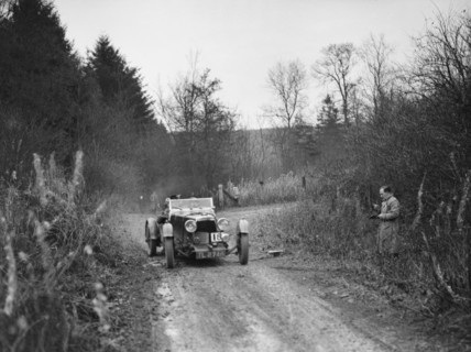 1932 Aston Martin competing in the Great West Motor Club Thatcher Trophy, 1938. Artist: Bill Brunell.