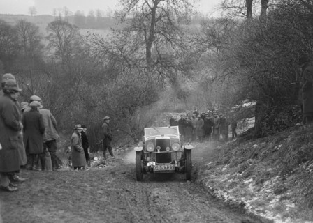 Alvis 12/60 of A Powys-Lybbe competing in the Sunbac Colmore Trial, Gloucestershire, 1933. Artist: Bill Brunell.