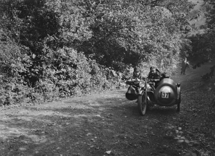 Motorcycle and sidecar of HD Jongs, Brighton and Hove Motor Club Brighton-Beer Trial, 1930. Artist: Bill Brunell.