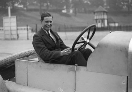 Bertie Kensington Moir in an Aston Martin crude test body, Brooklands, c1921. Artist: Bill Brunell.