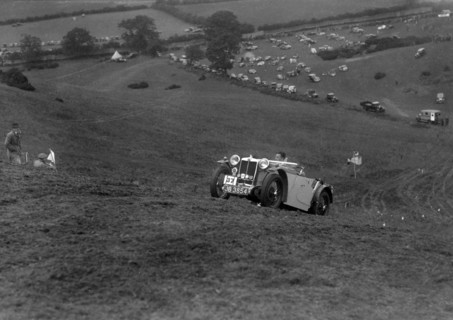 MG PA of the Cream Cracker team competing in the MG Car Club Rushmere Hillclimb, Shropshire, 1935. Artist: Bill Brunell.