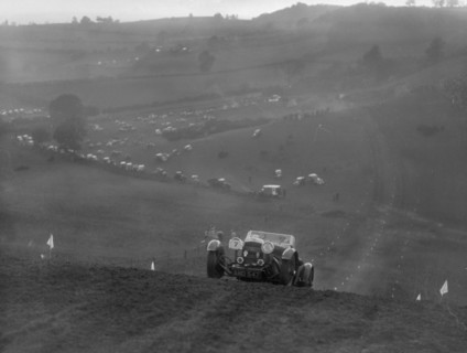 Aston Martin competing in the MG Car Club Rushmere Hillclimb, Shropshire, 1935. Artist: Bill Brunell.