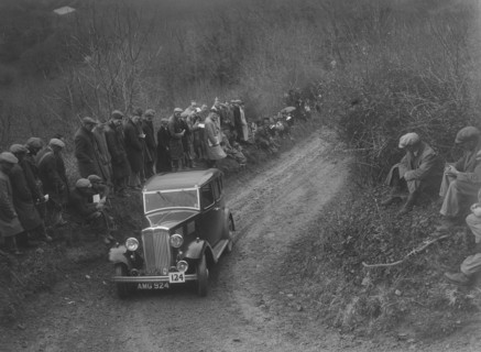 Standard saloon of HF Deane competing in the MCC Lands End Trial, 1935. Artist: Bill Brunell.